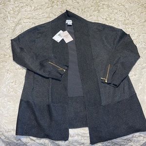 Women’s Carmen Marc Valvo light jacket. Size large